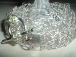 PULSERA TEJIDA CON HILO DE PLATA